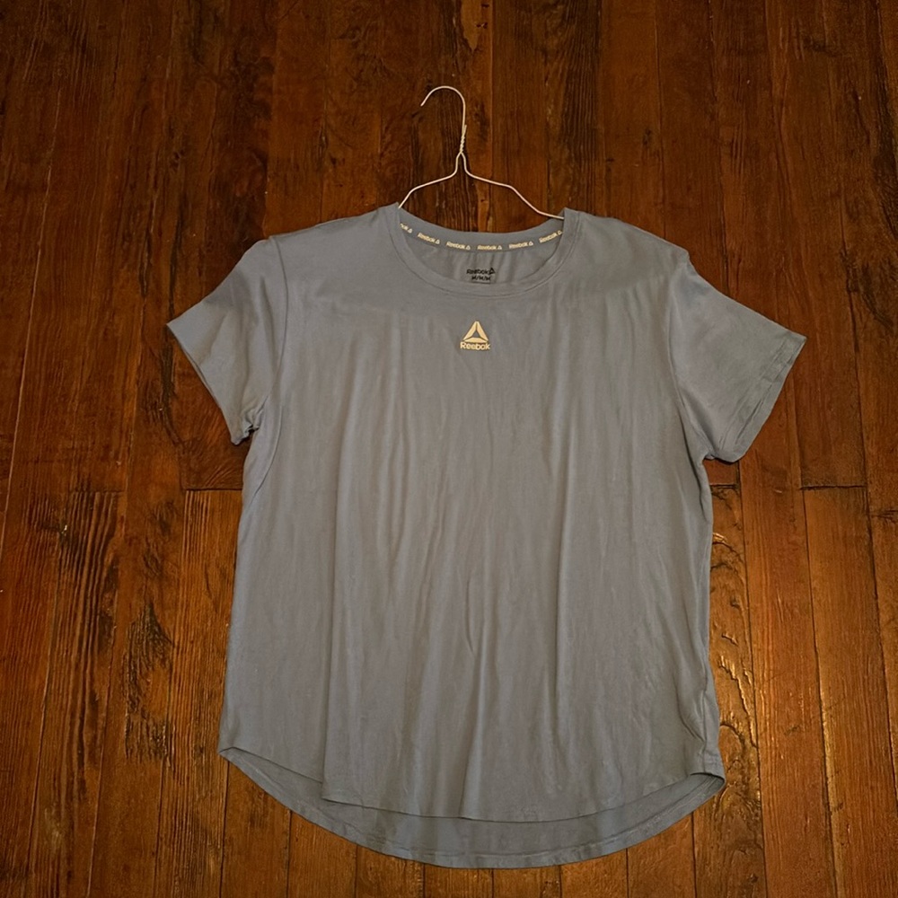 Reebok women blue medium shirt